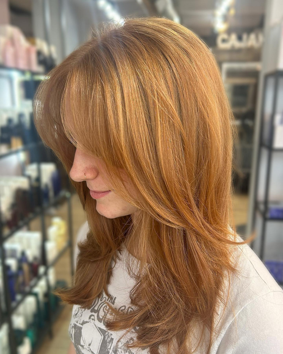 Blonde Classic Layer Bob With Side Swept Bangs
