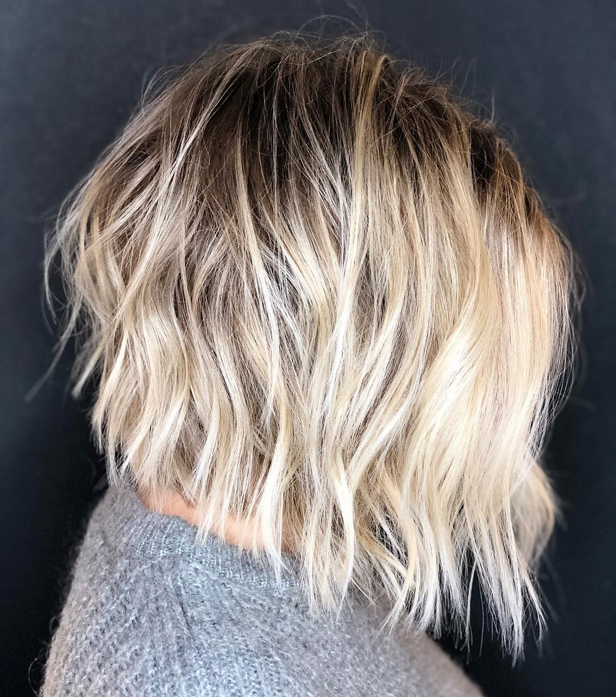 Choppy Slanted Blonde Messy Bob