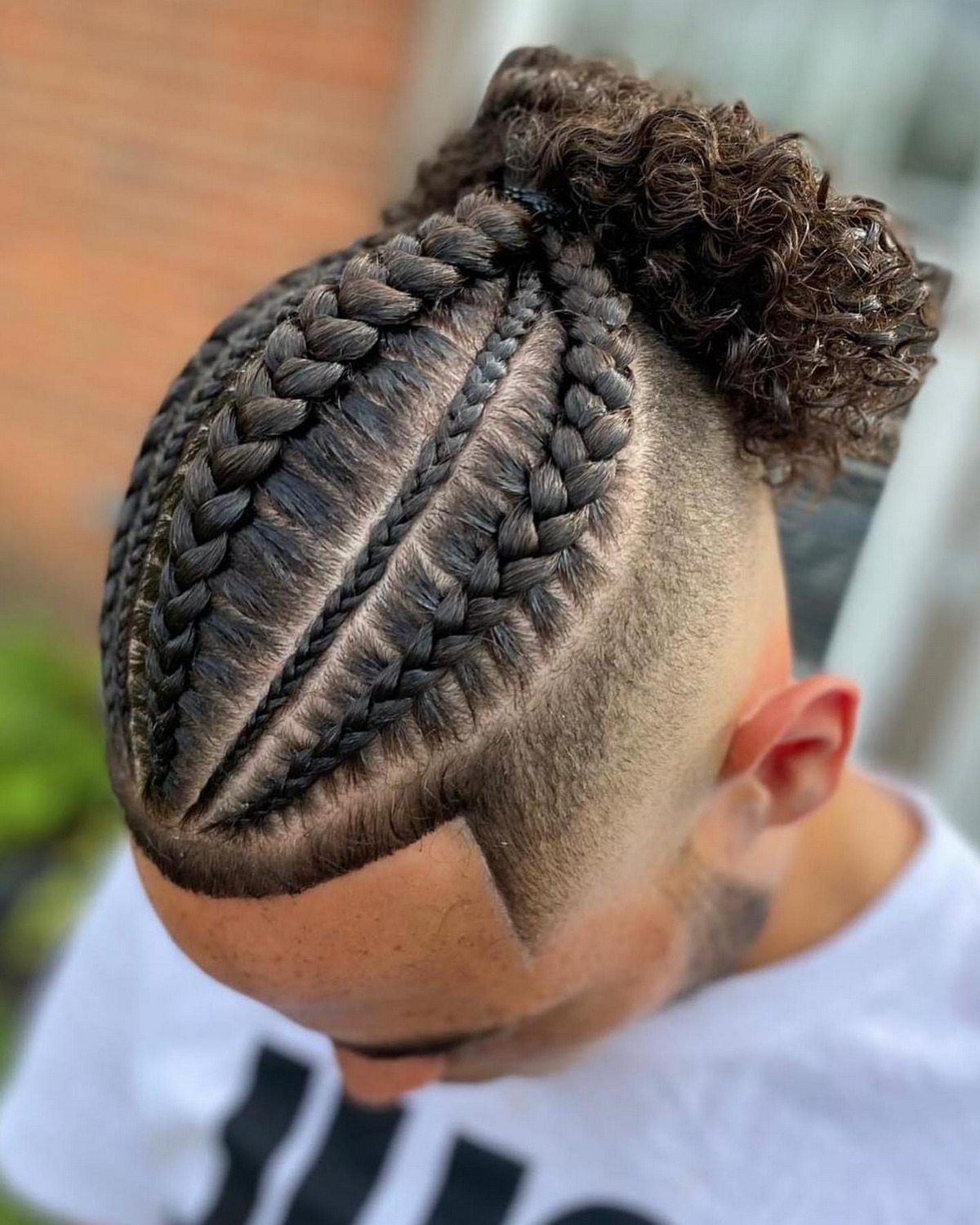 Cornrow Braid With A Curly Man Bun