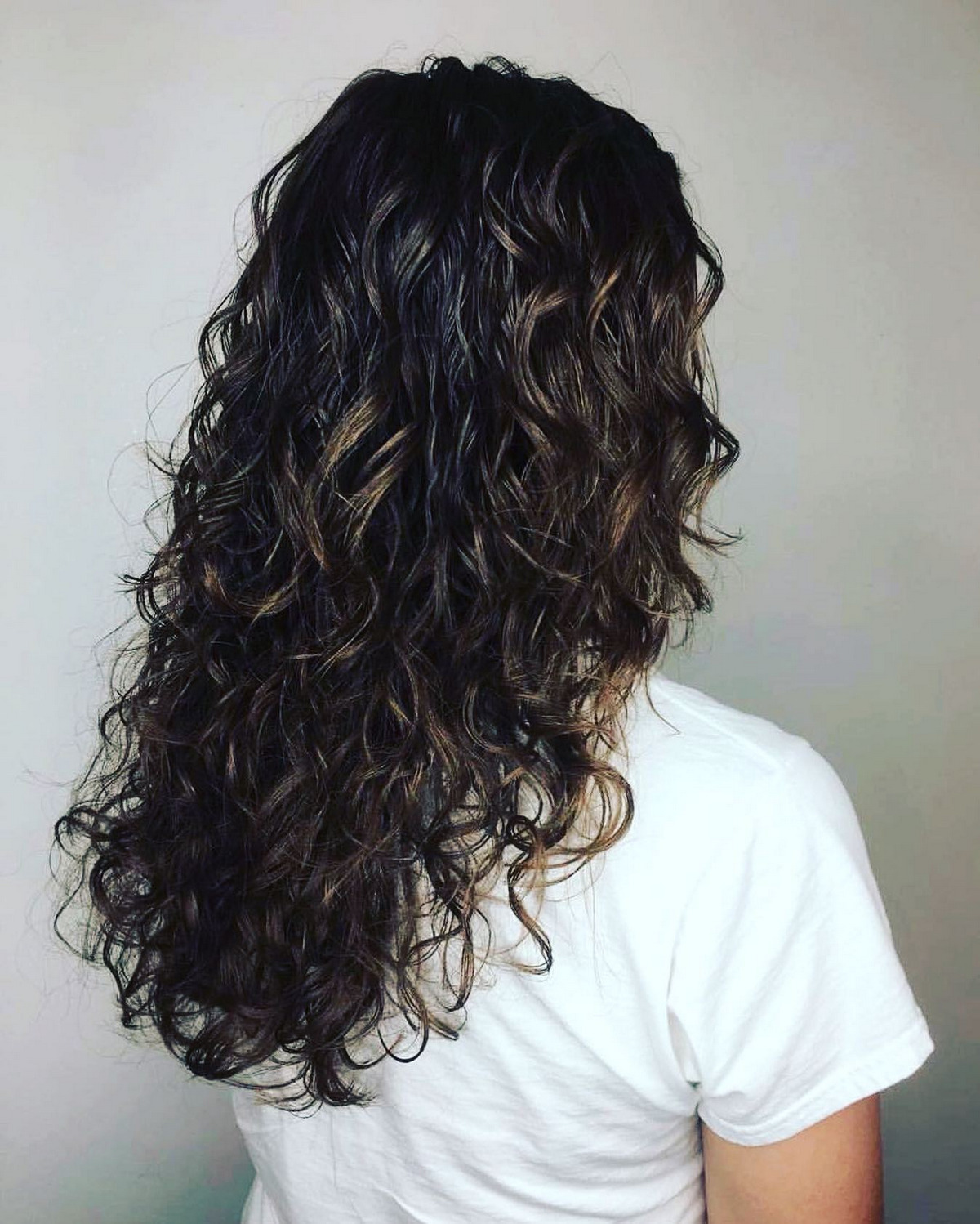Long Dark Wavy Hairstyle with Highlighted hair