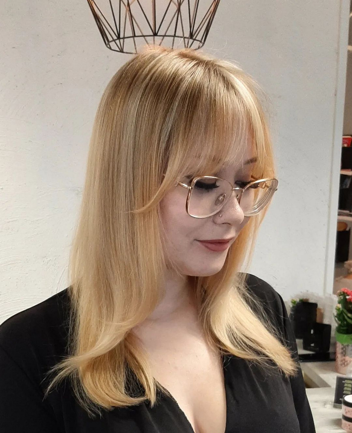Shiny Blond Hair With Wispy Curtain Bangs