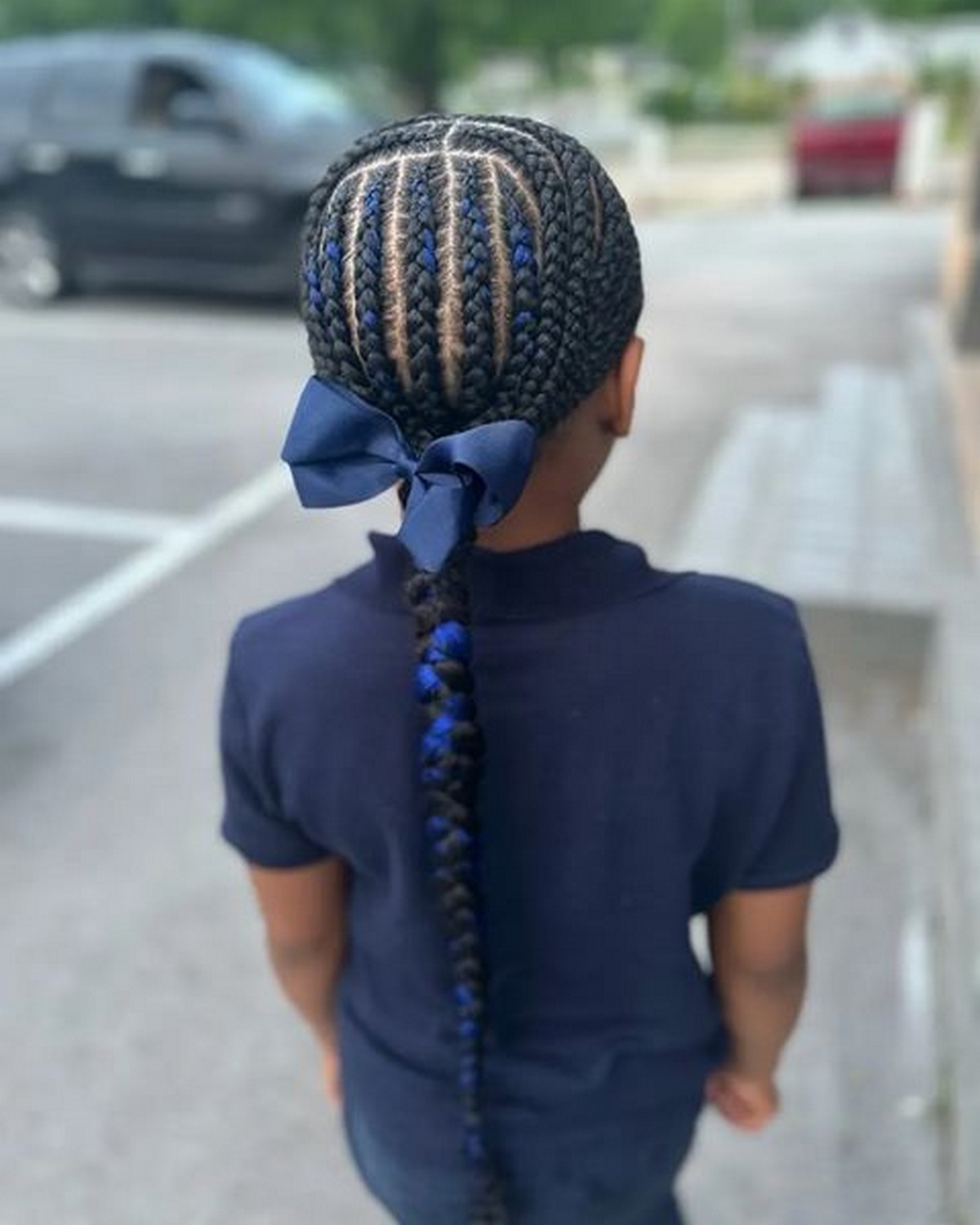 Braided Slick Back With A Sprinkle Of Blue