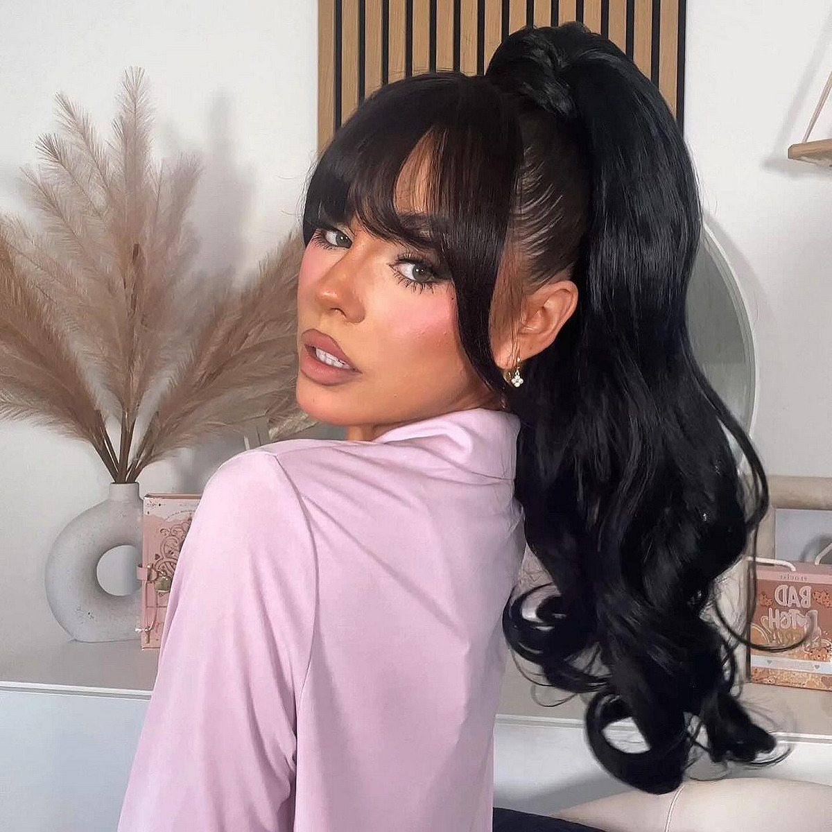High Ponytail With Wispy Bangs
