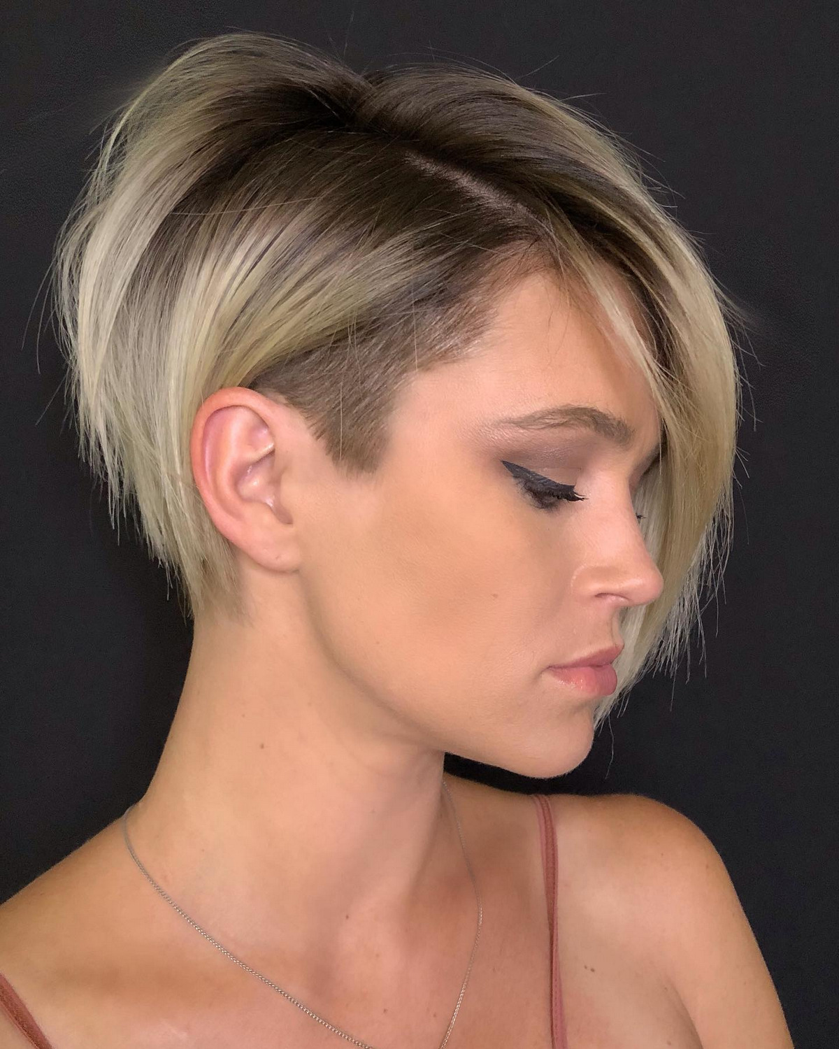 Razored Pixie Bob With Temple Undercut And Long Side Bangs