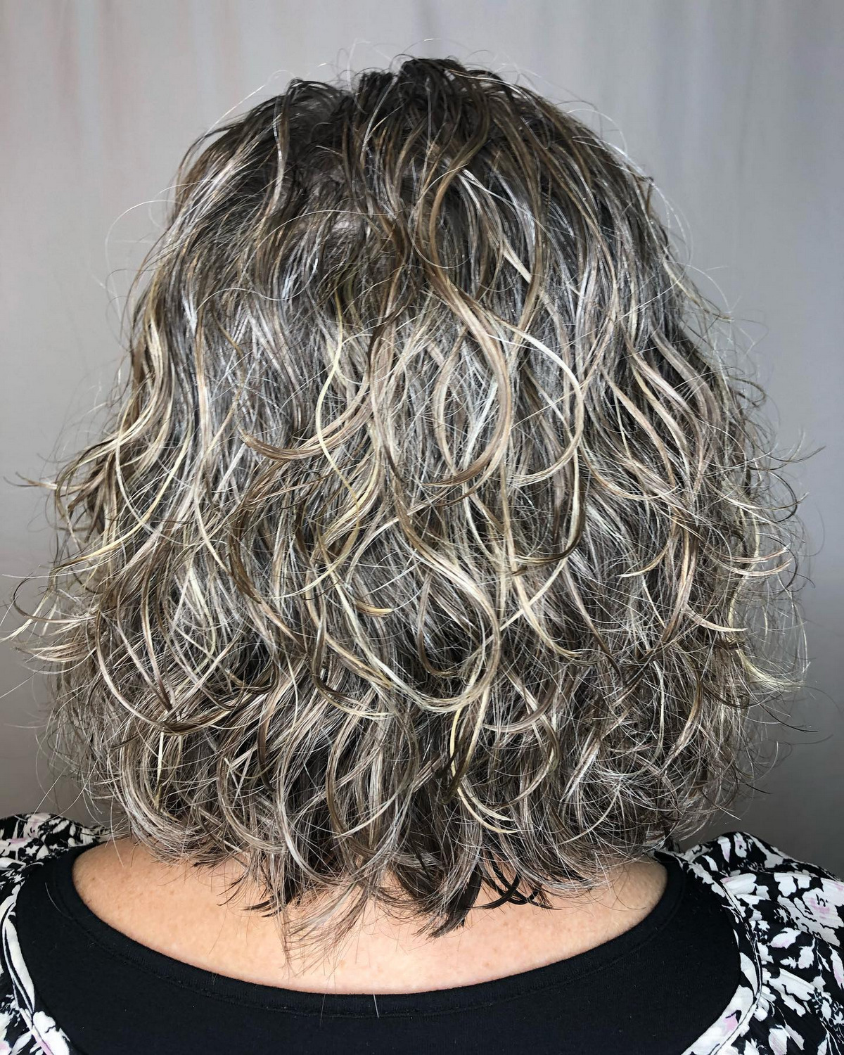 Gray Perm Bob with Blonde Highlights