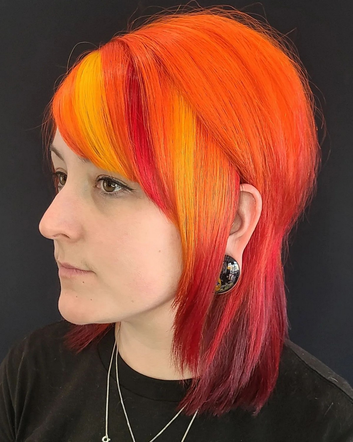 Highlight Orange Hair With Side-Swept Bangs