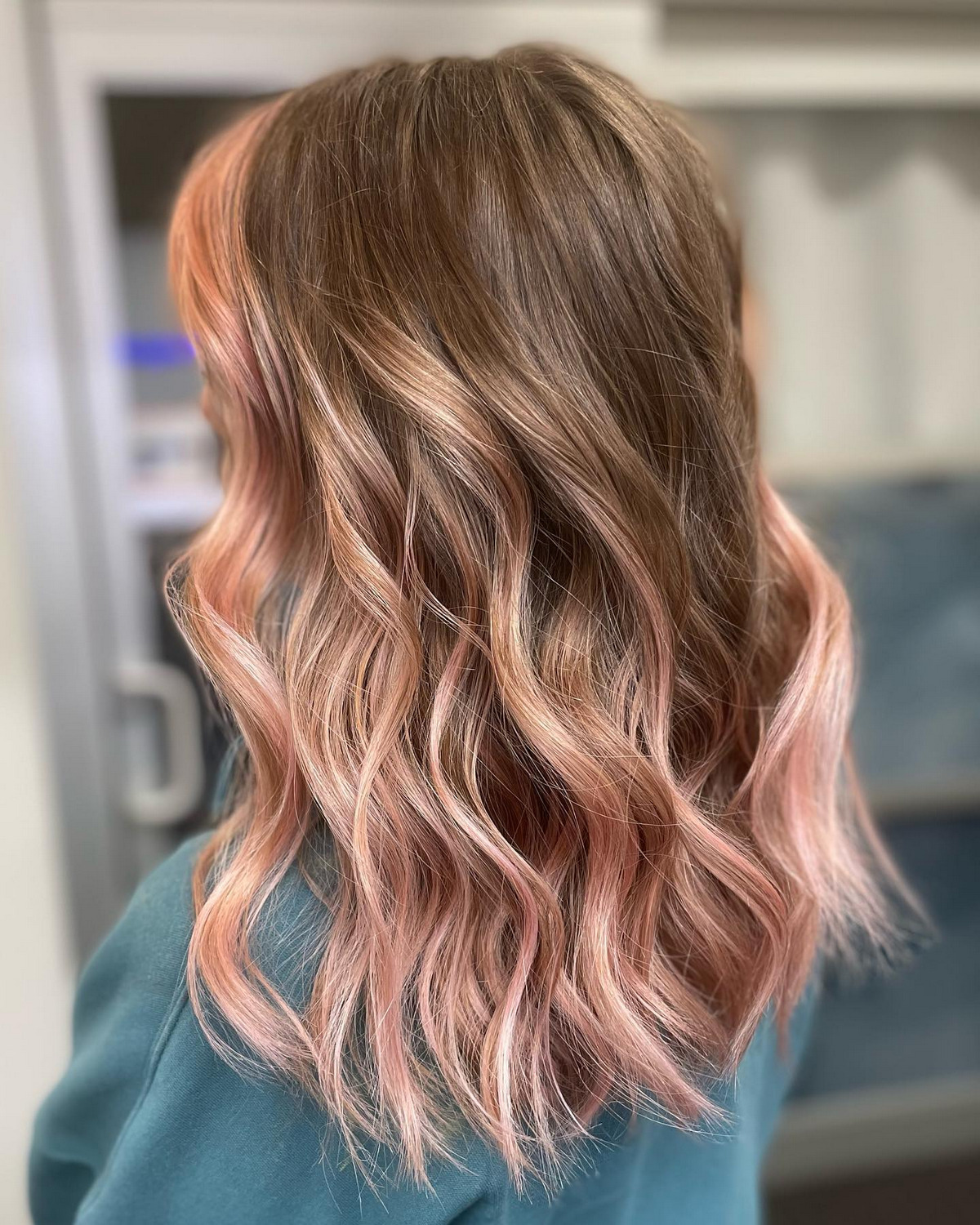 Medium Blonde With Rose Gold Highlights