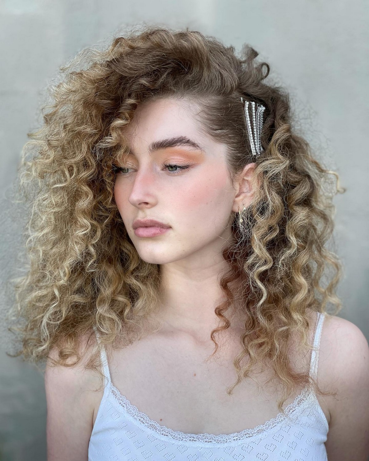 Side Swept And Natural Curls