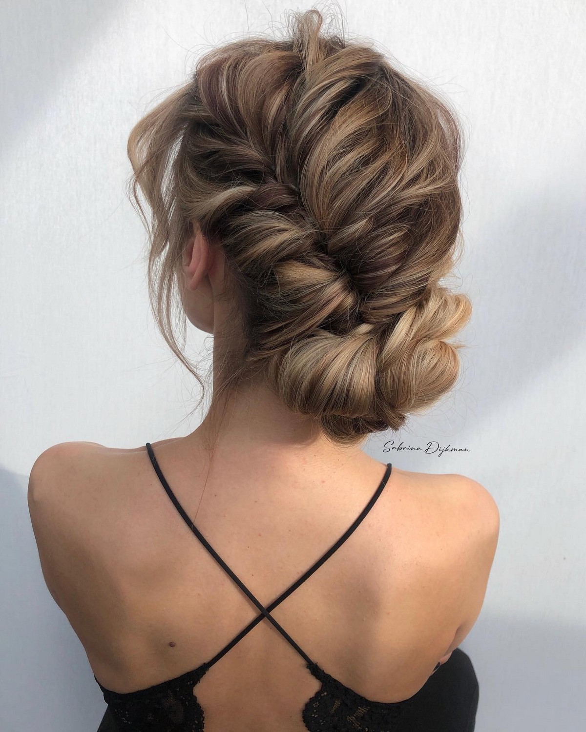 Romantic Braid With Low Bun