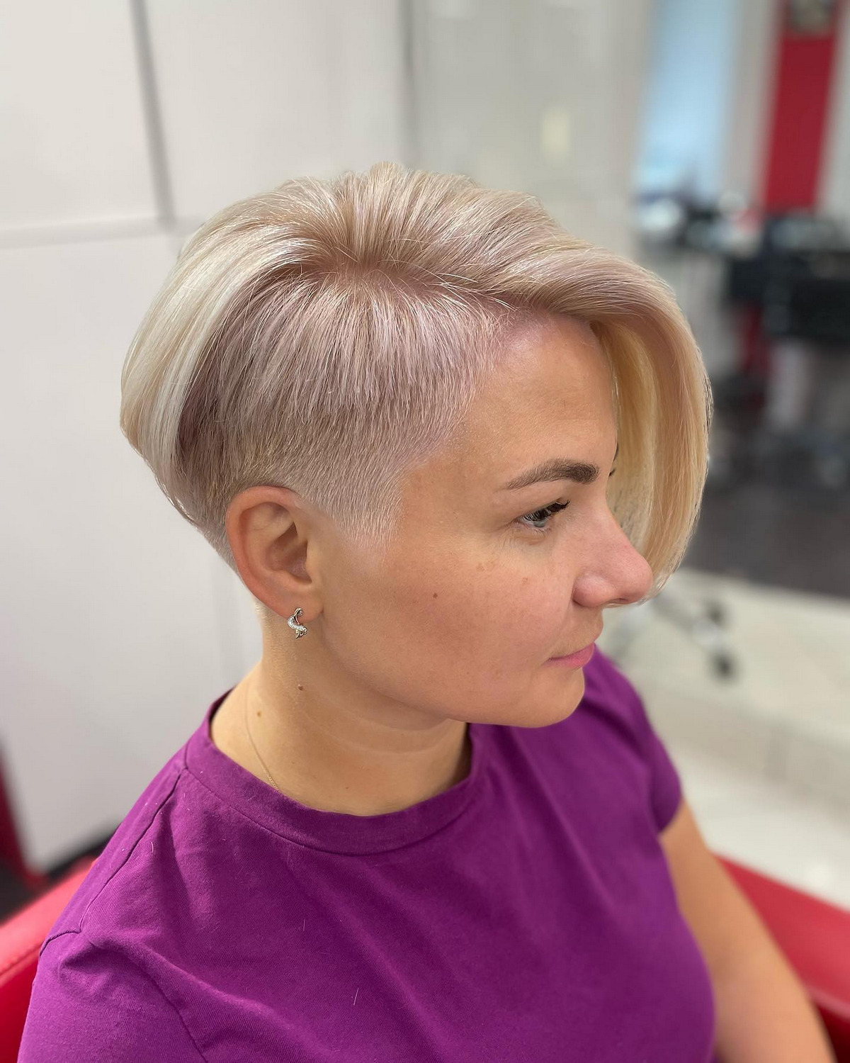 Funky Edgy Short Hairstyle Half Shaved