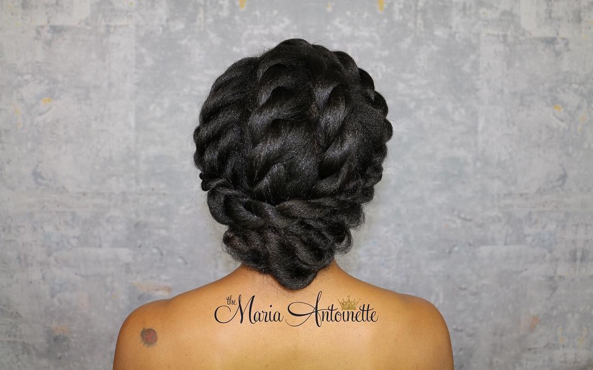 Adorable Loosely Twisted Updo For Naturalist