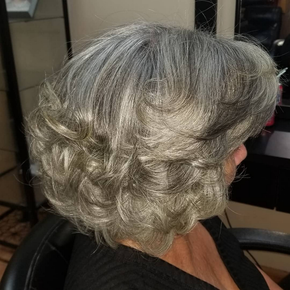 Gray Curled Layers With Feathered Bangs