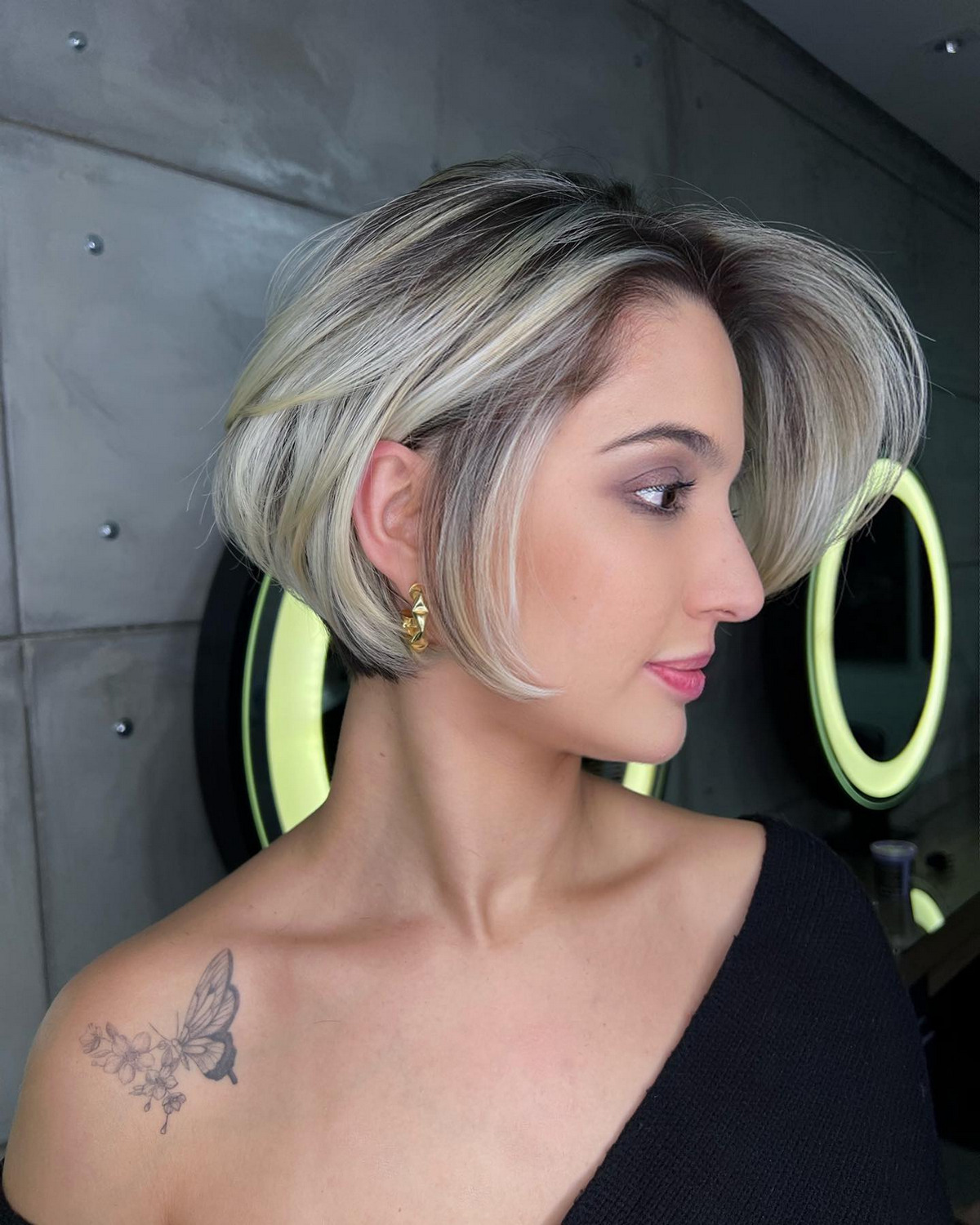 Blonde Stacked Bob With Black Roots
