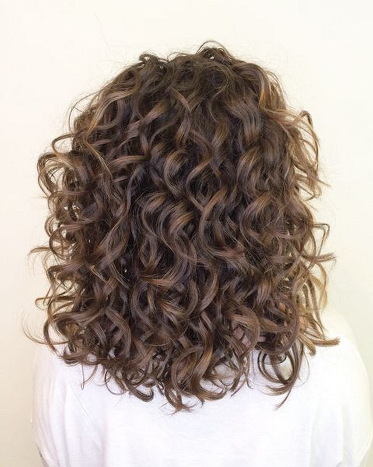 Medium Curly Bouncy Hairstyle