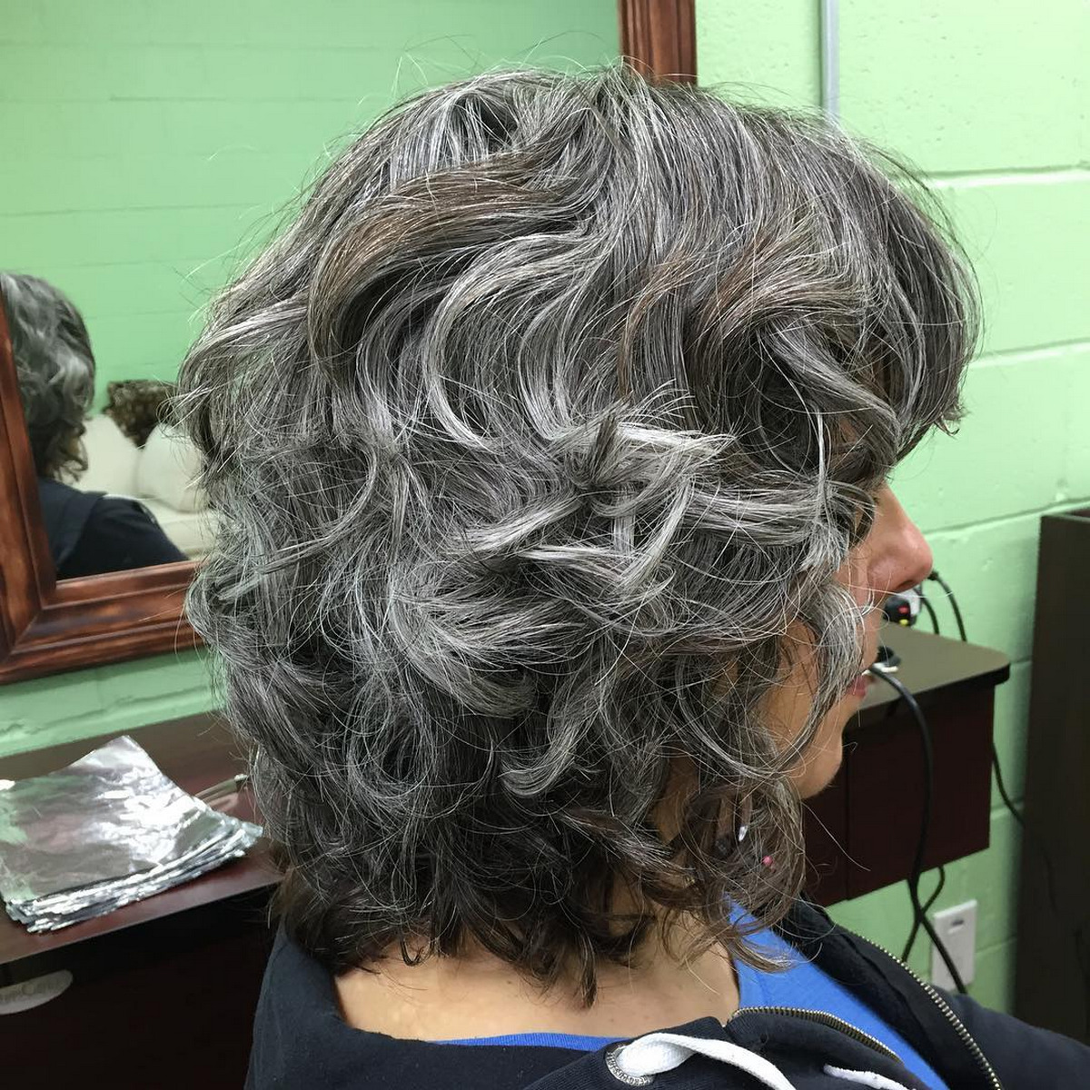 Curly Brown And Gray Balayage Short Hair