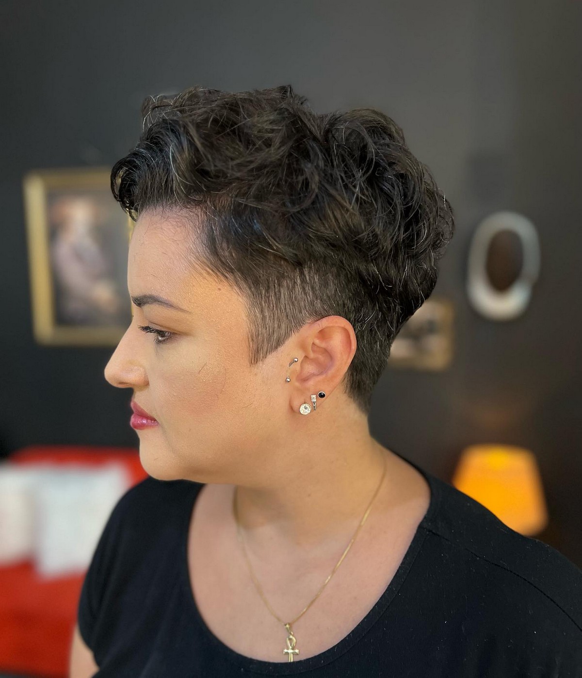 Short Curly Side-Swept Bangs with a Tapered Back