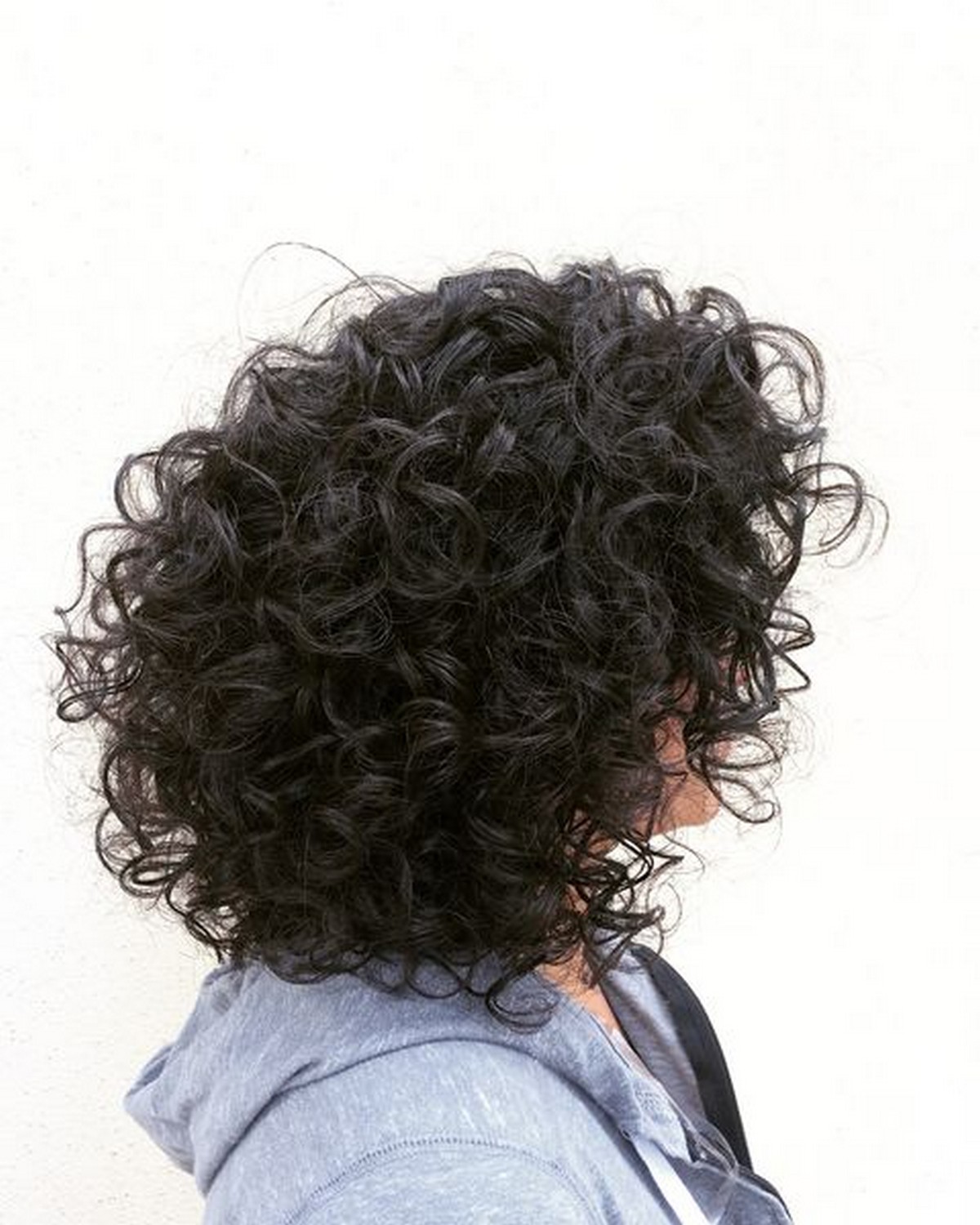 Medium Voluminous Hairstyle With Bouncy Curls