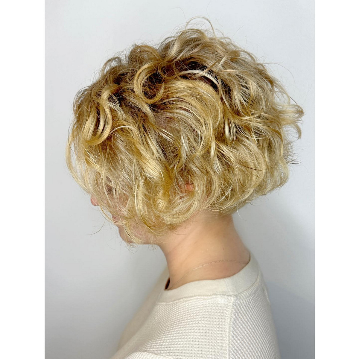 Blonde Curly Bob With Highlights