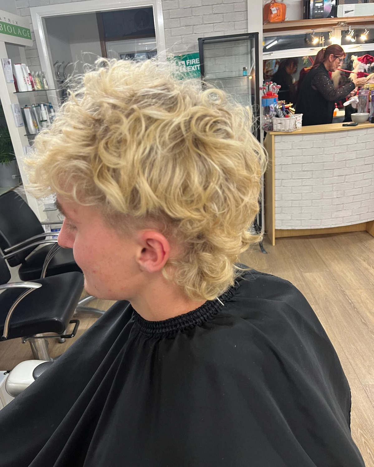 Blonde Hairstyle With Curly Mullet
