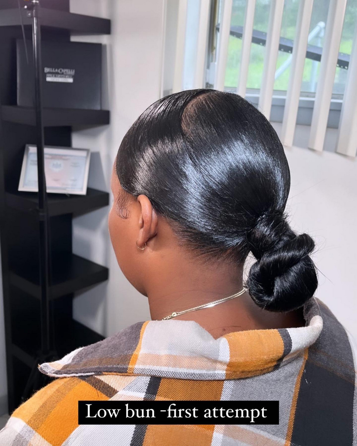 Middle-Part Low Bun