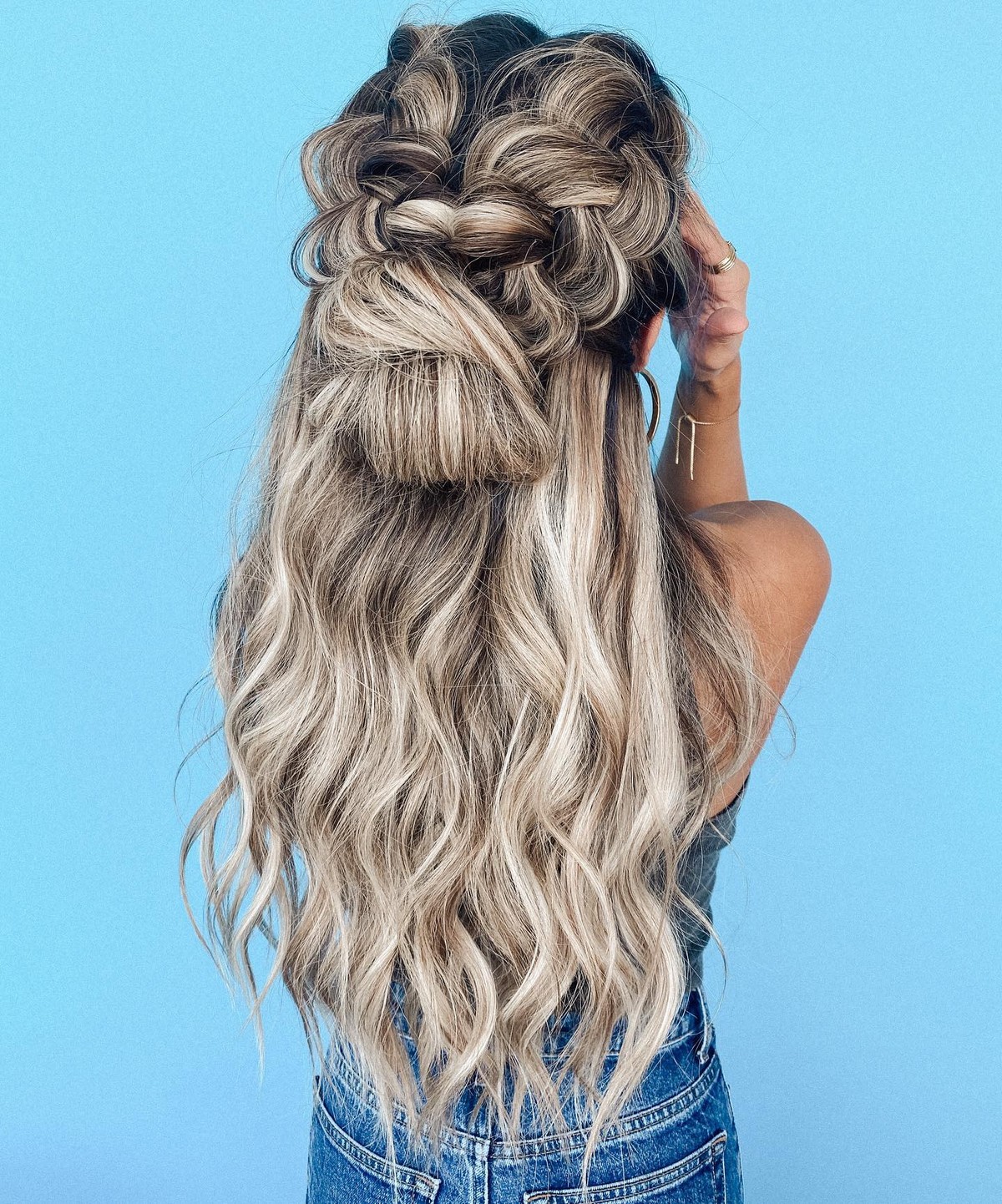 Side Braid And Knot With Loose Hair