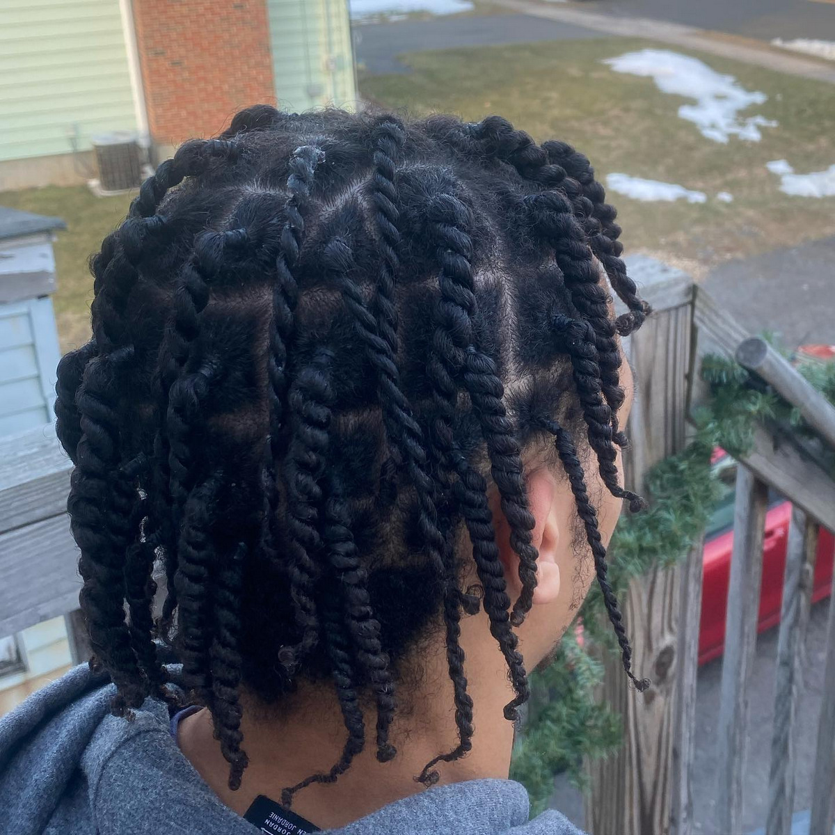 Two-strand twists hairstyle for boys and girls