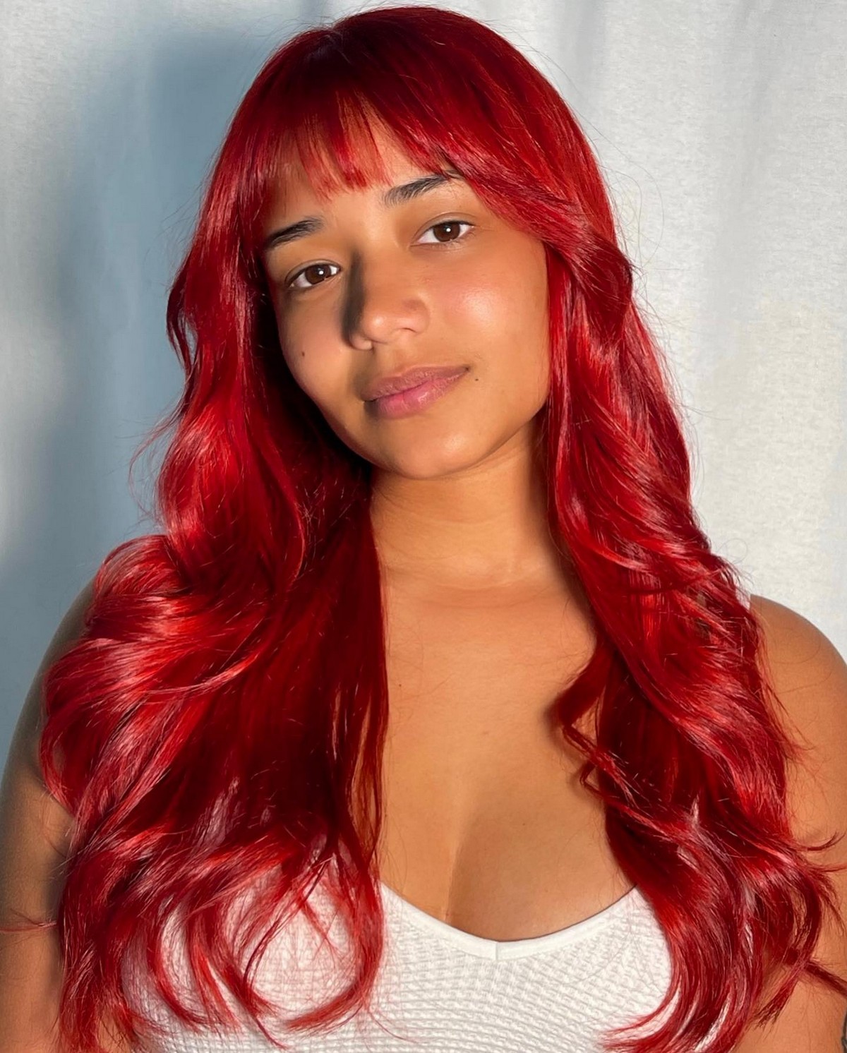 Layered Red Wavy Hair With Arch Bangs In Ariel Style