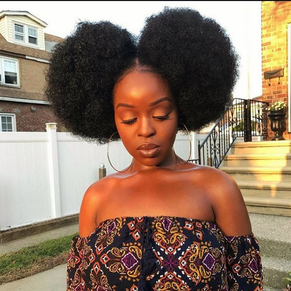 Wash and go hairstyle with double puffs