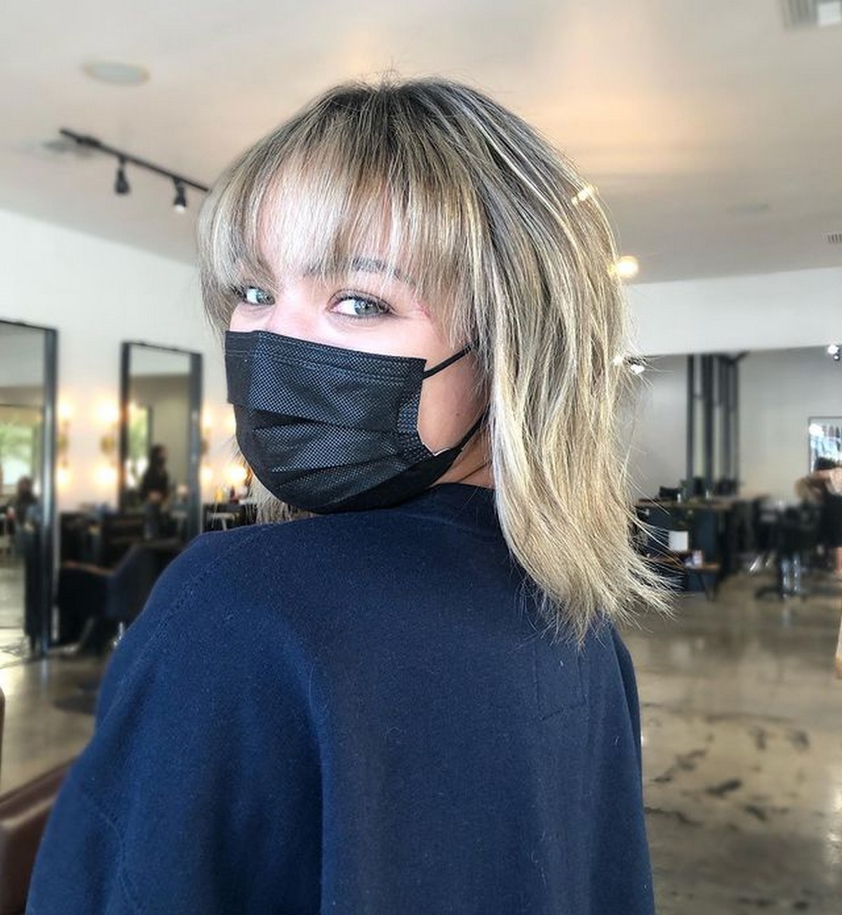 Blonde Shaggy Hair With Dark Roots