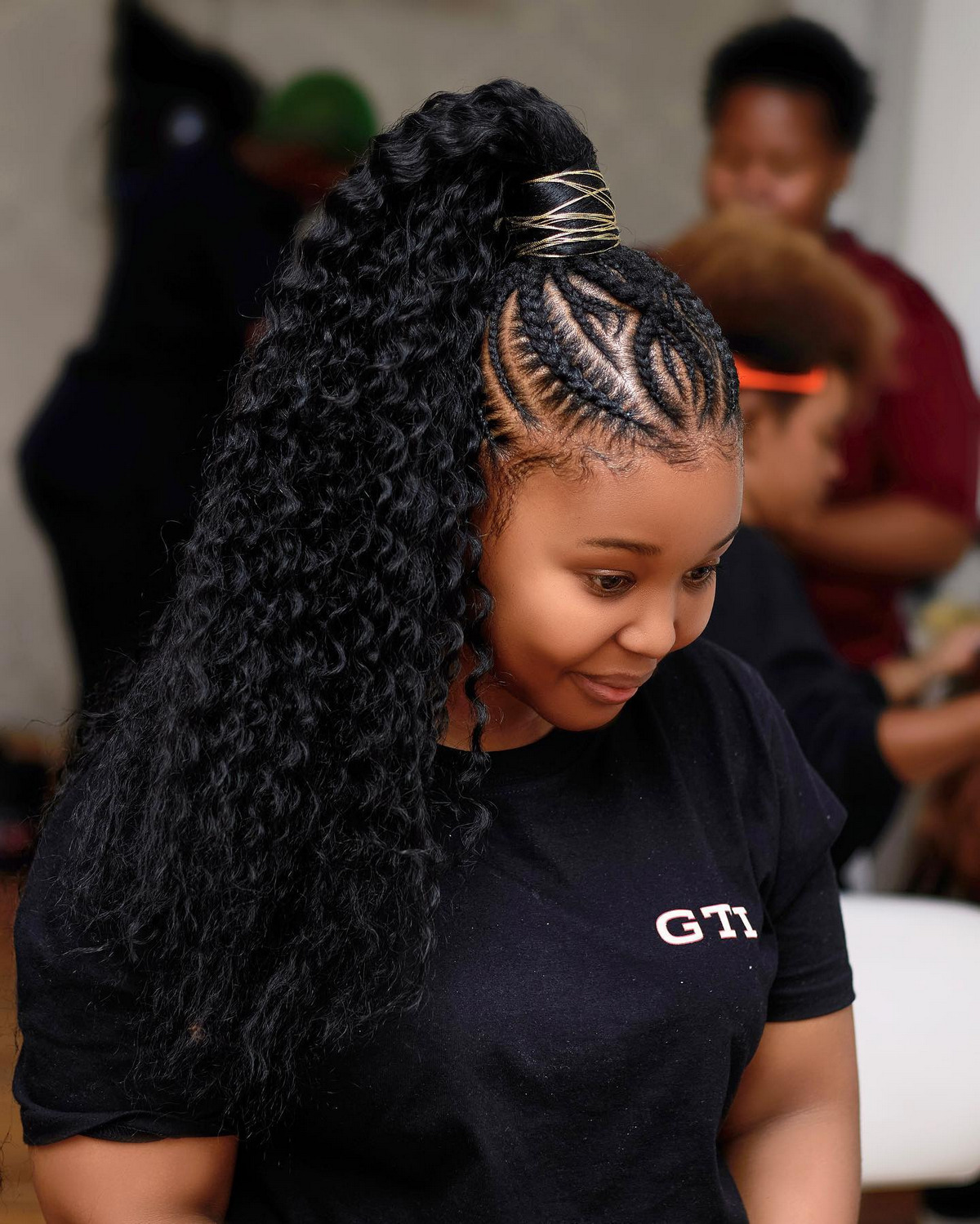 Curly Ponytail with Cornrow Braids