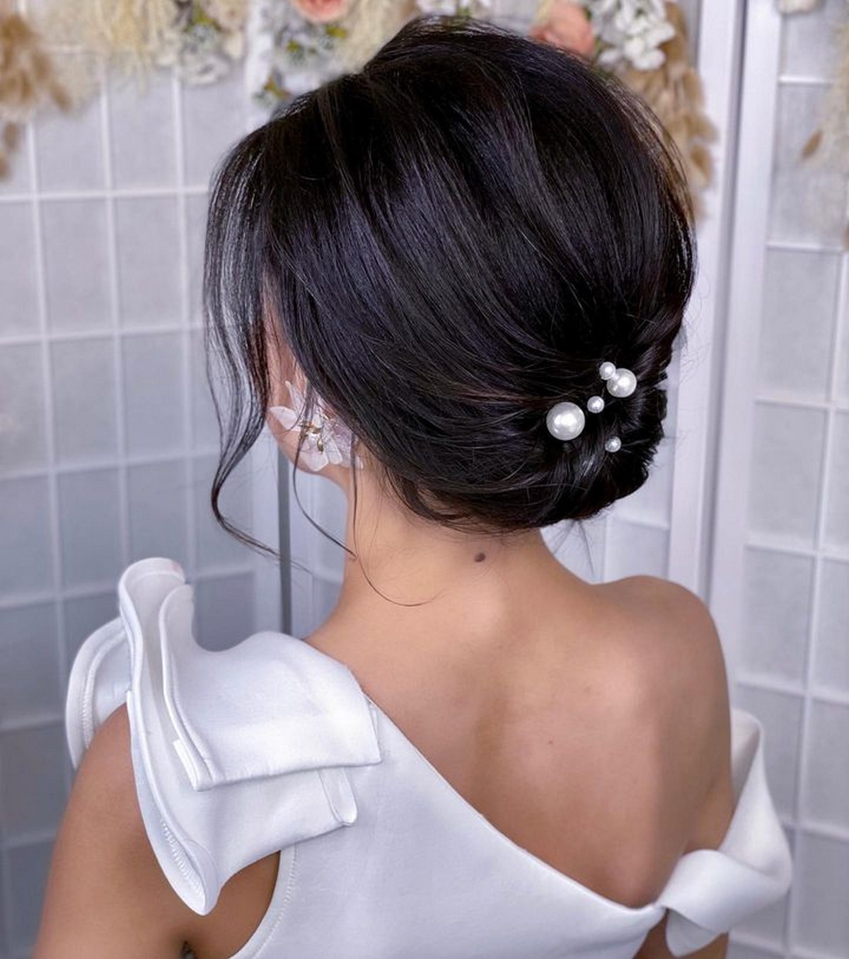 Embellished Low Roll Updo