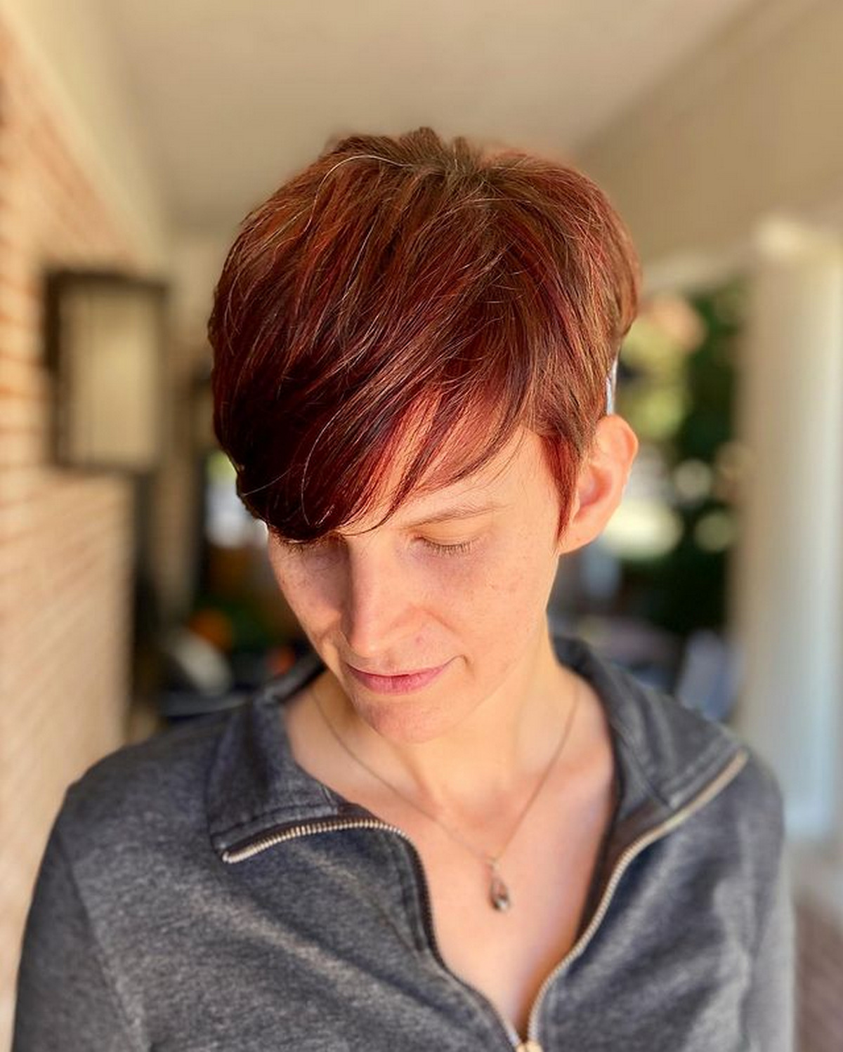Highlighted Red Pixie Cut