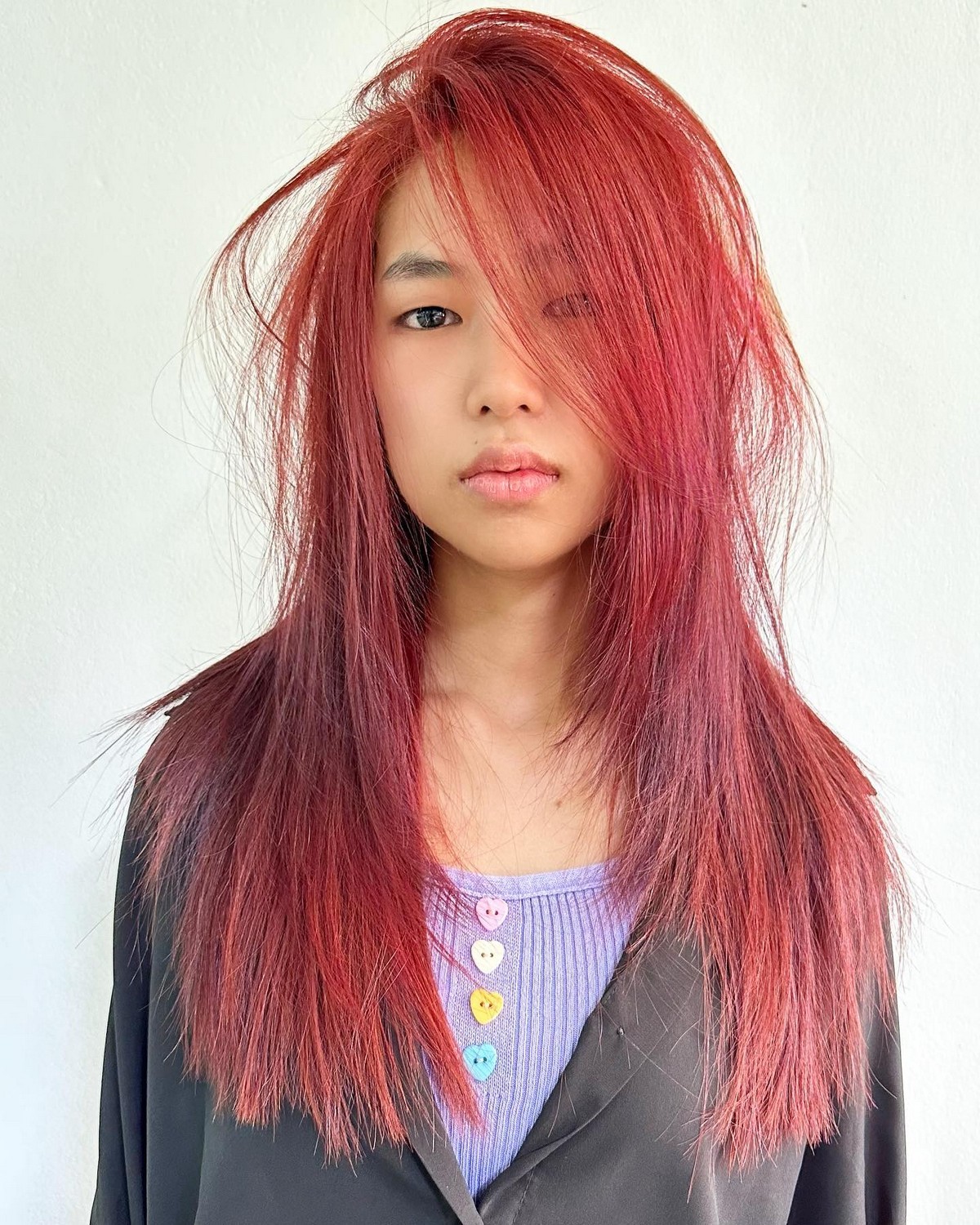 Long Layered Straight Hair With Side Bangs In Red