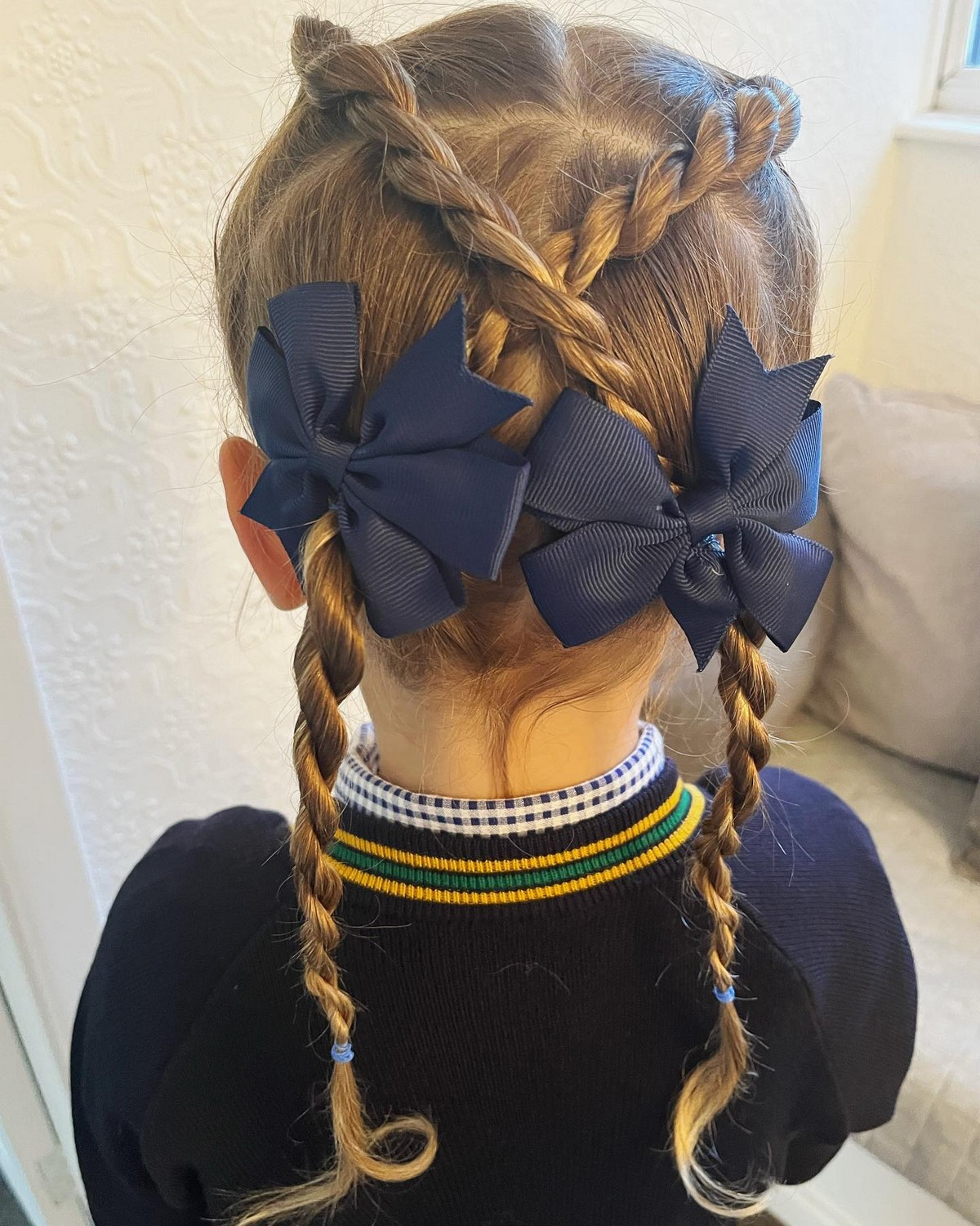 Two Tail Braid And Blue Bow