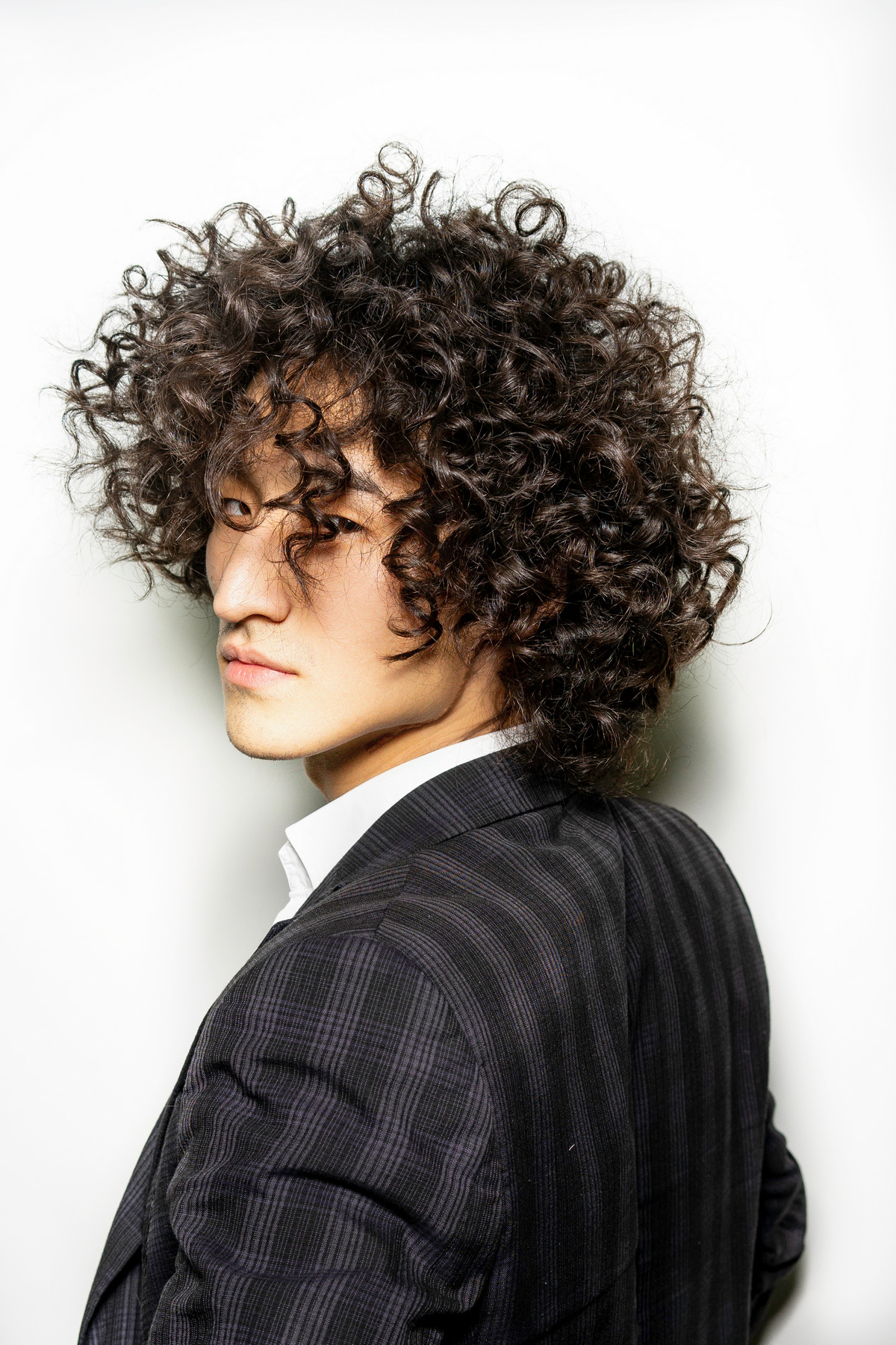 Hairstyle for men  Trendy hairstyles for men with curly hair