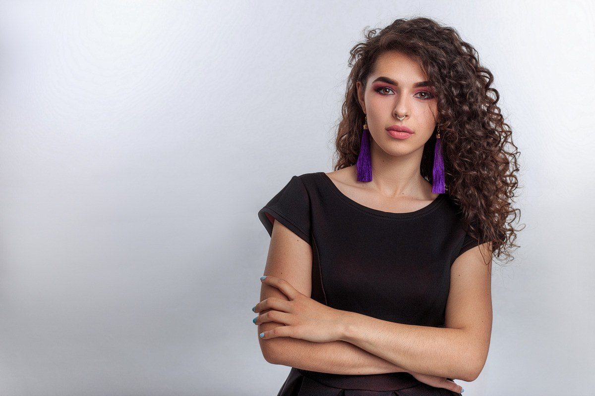 Thin Curly Hair With Side Swept Bangs