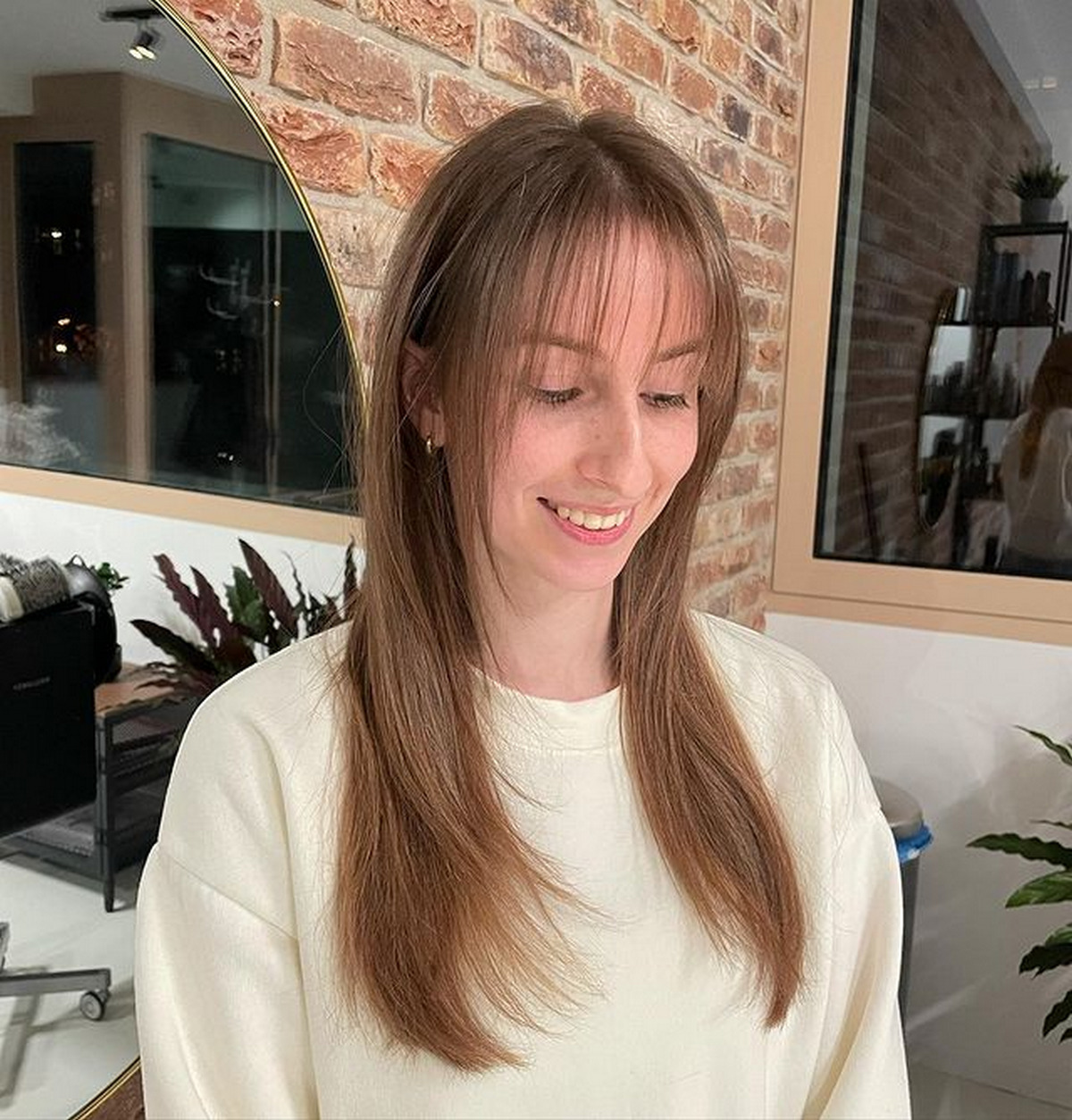 Wispy Bangs and Face-Framing Layers for Long Hair