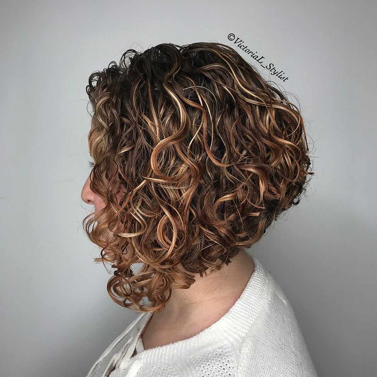 Angled Curly Bob With Highlights