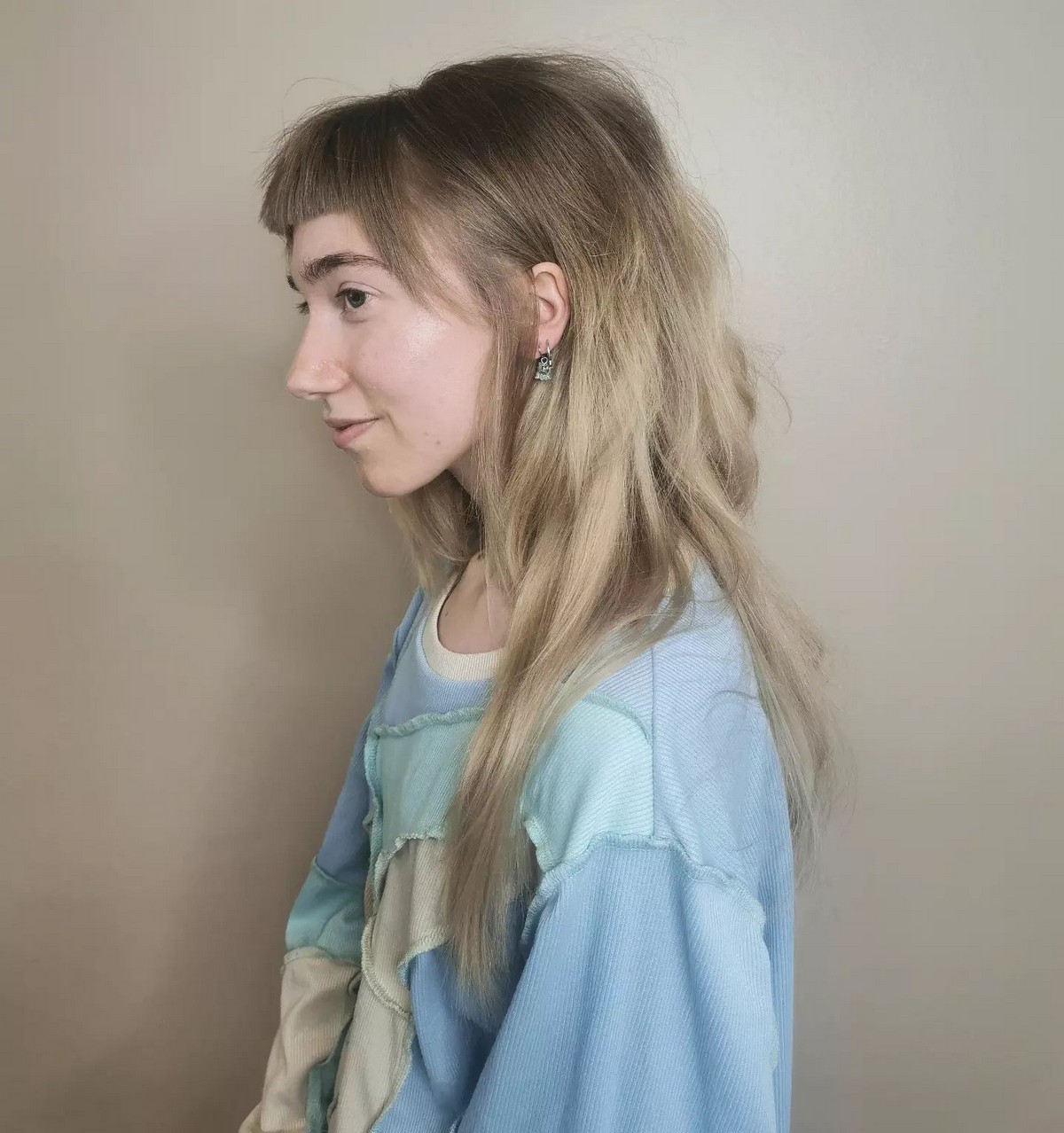 Shaggy Layered Cut And Baby Bangs