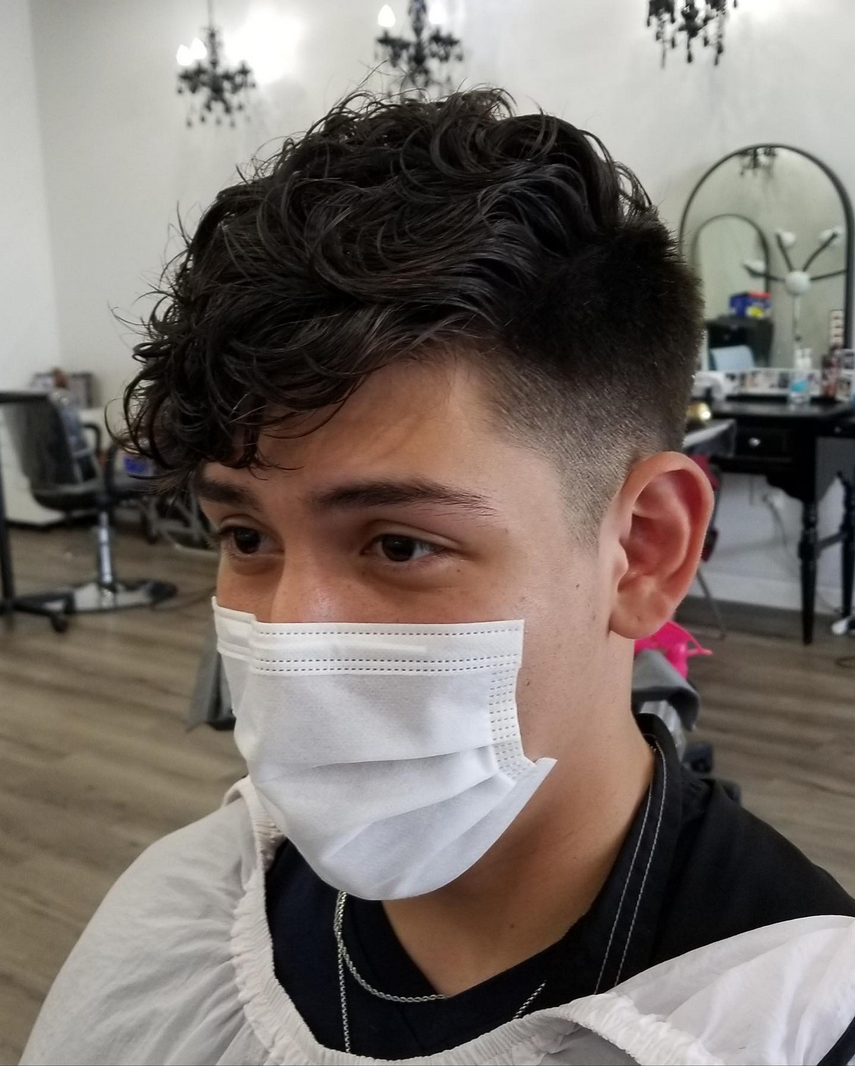 Perm With Fade And Shaved Design