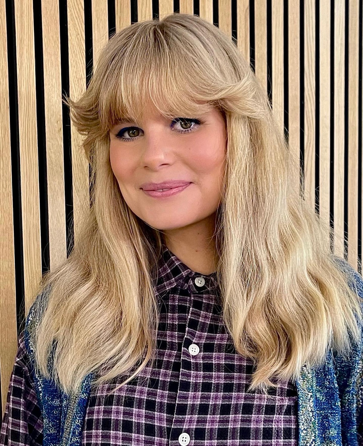 Blonde Layers With 70s Bangs Style