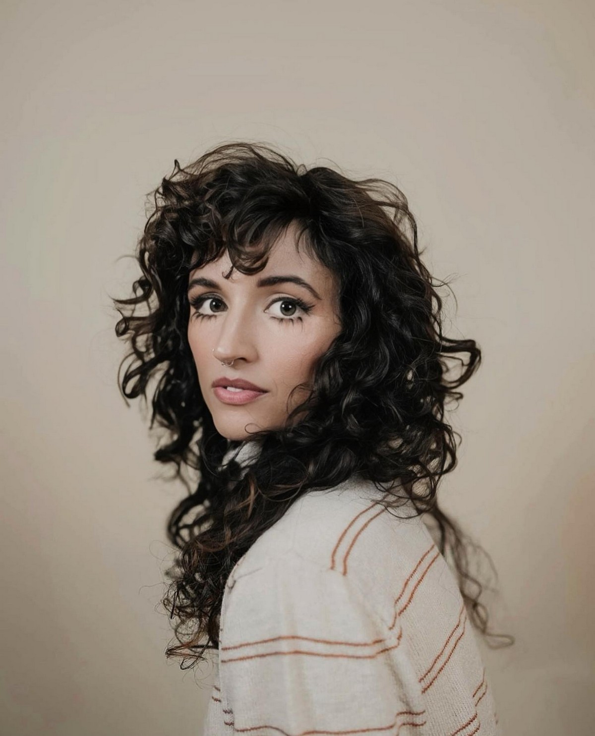 Curly Shag Haircut And Bangs