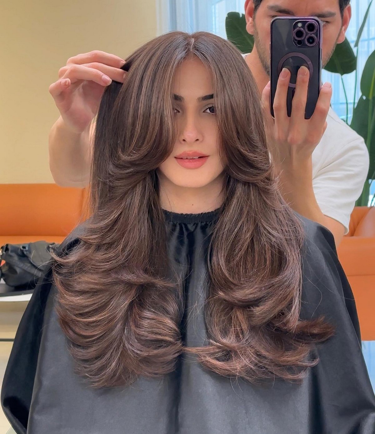 Long Brown Layered Hair With Curtain Bangs