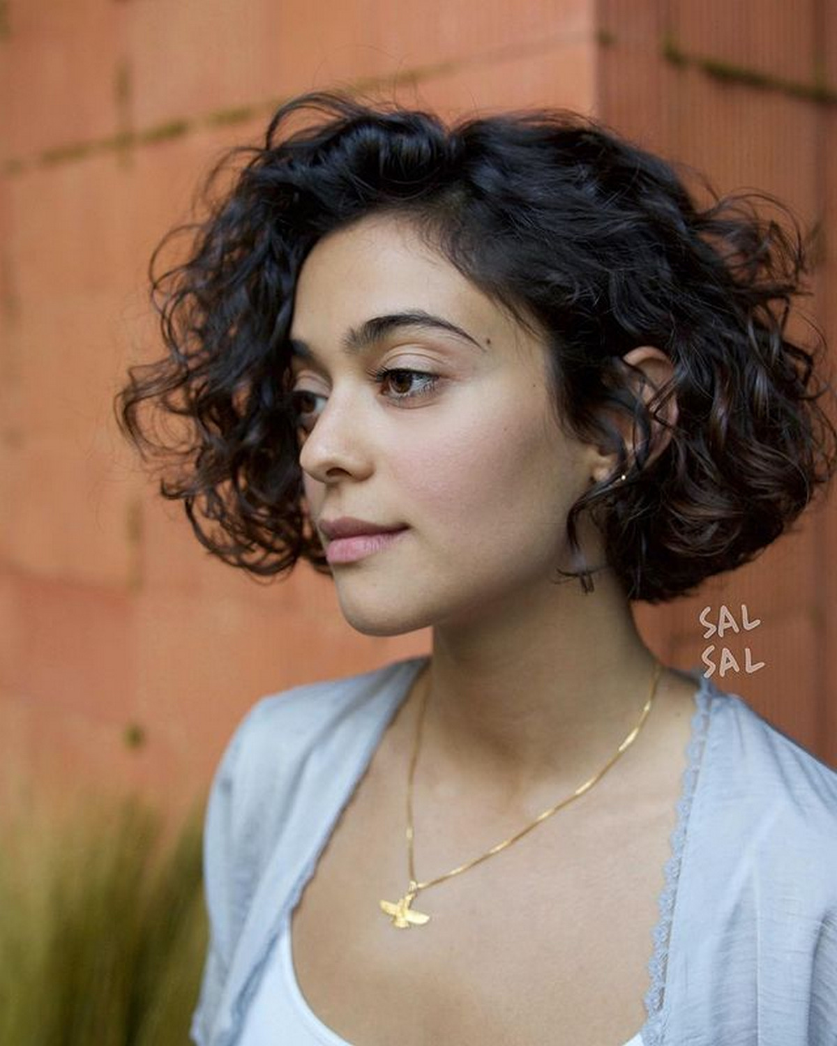 Side-Parted Curly Brunette Bob