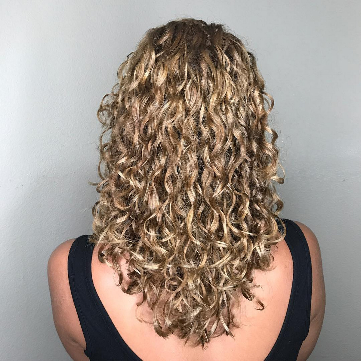 V-Cut Long Curly Blonde Hairstyle