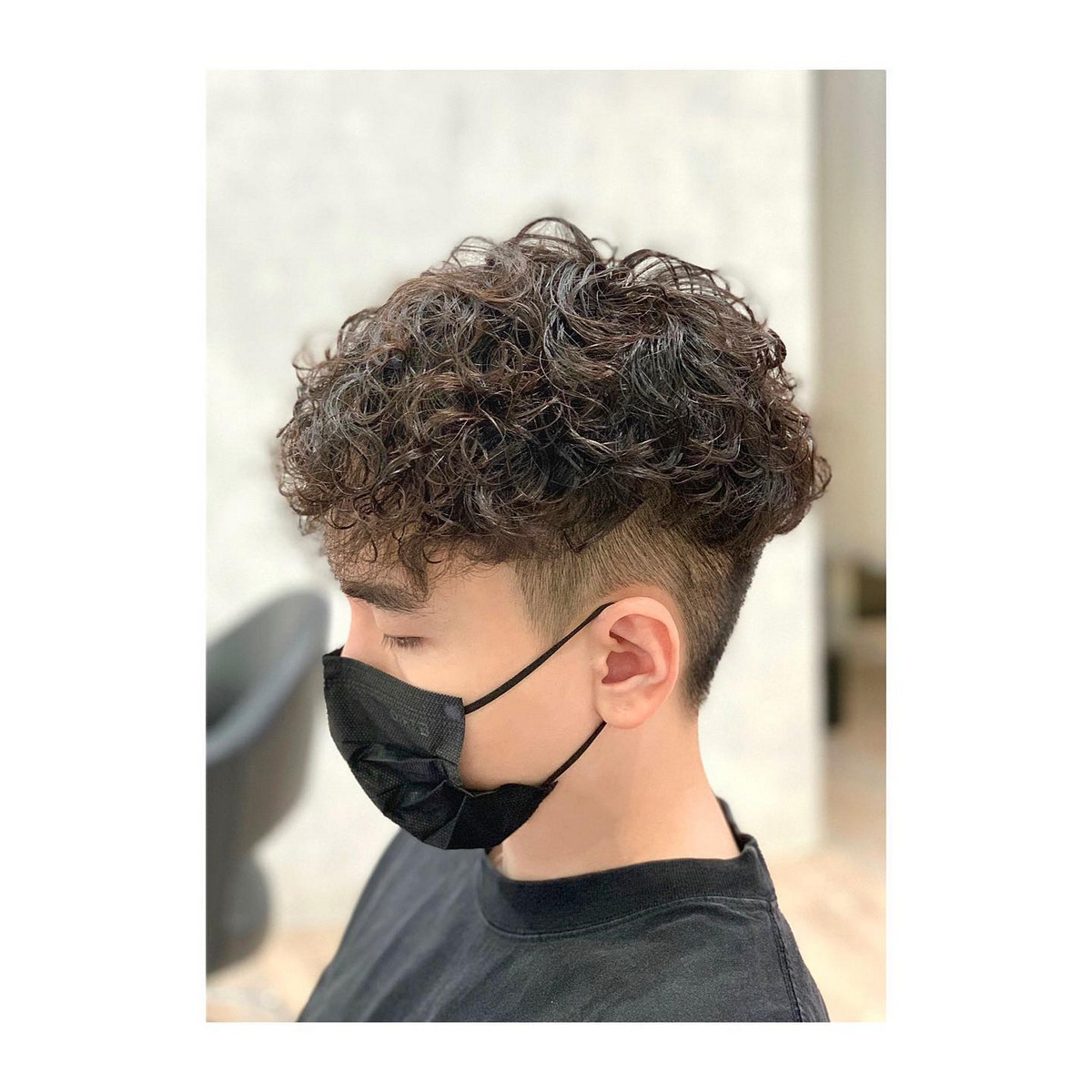 Curly Korean Perm With Low Shaved Sides