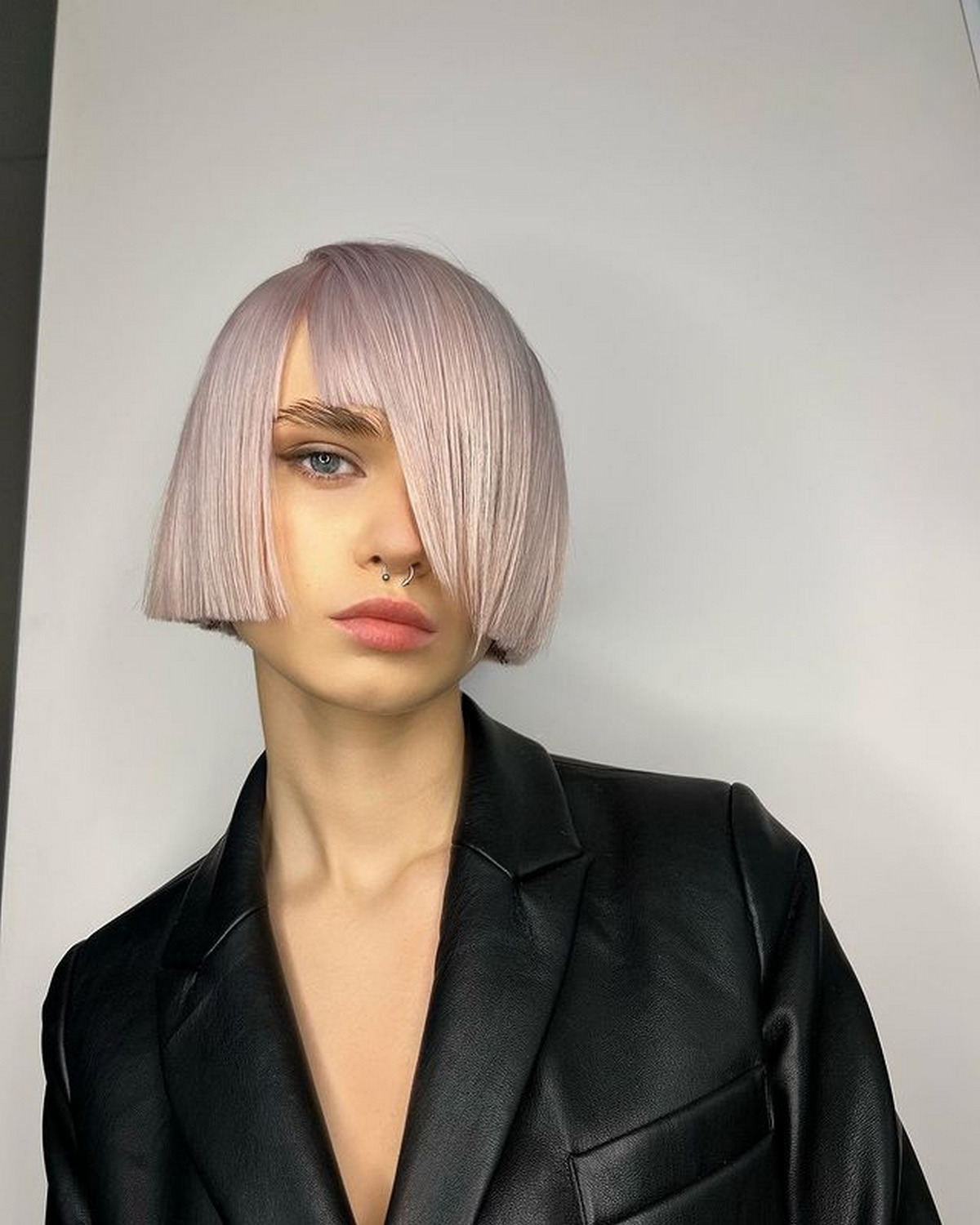 High-Fashion Asymmetric Bangs