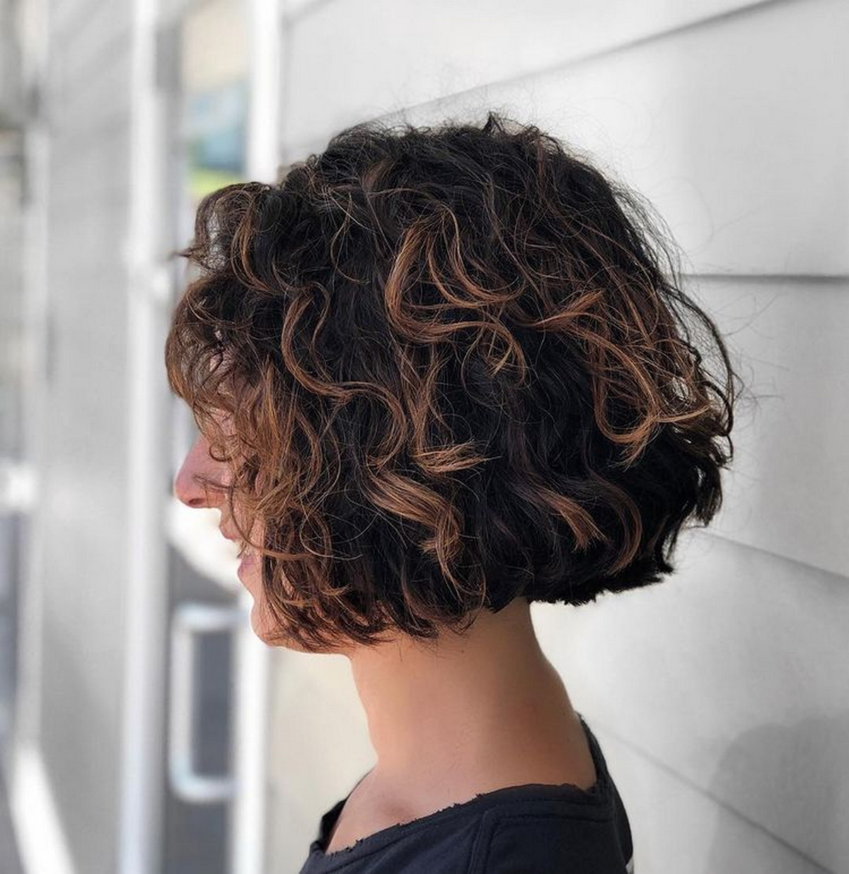 Jaw-Length Curly Bob With Caramel Highlights
