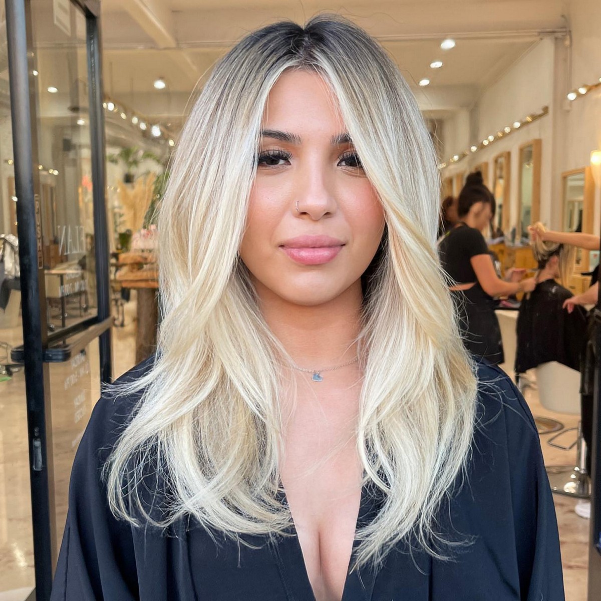 Platinum Blonde Highlights With A Root Shadow On Black Hair