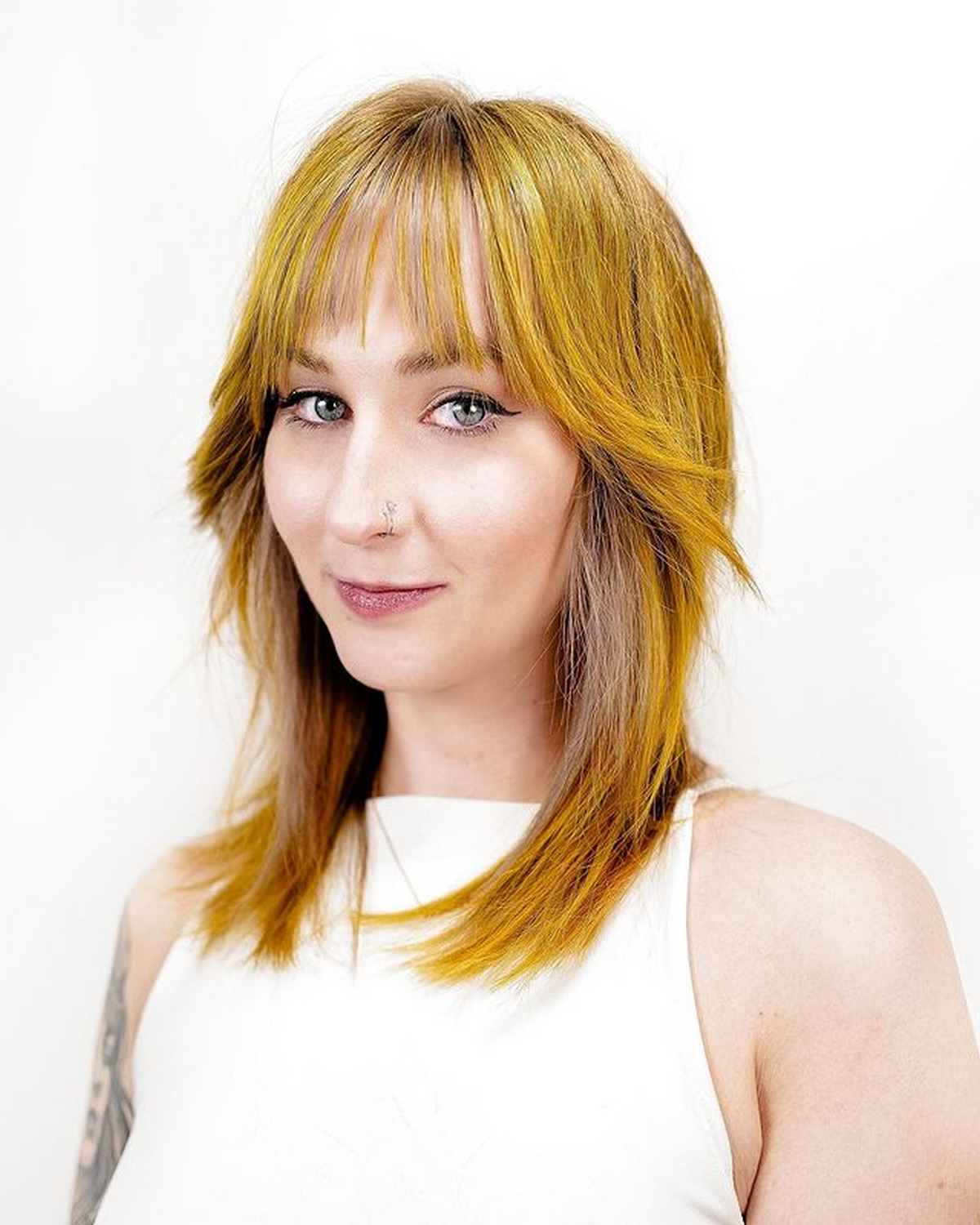 Soft and Flattering Curtain Bangs